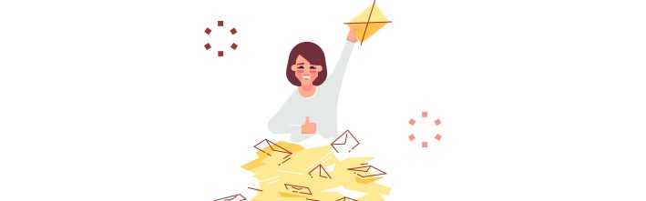 Woman in front of a pile of mail holding up an envelope