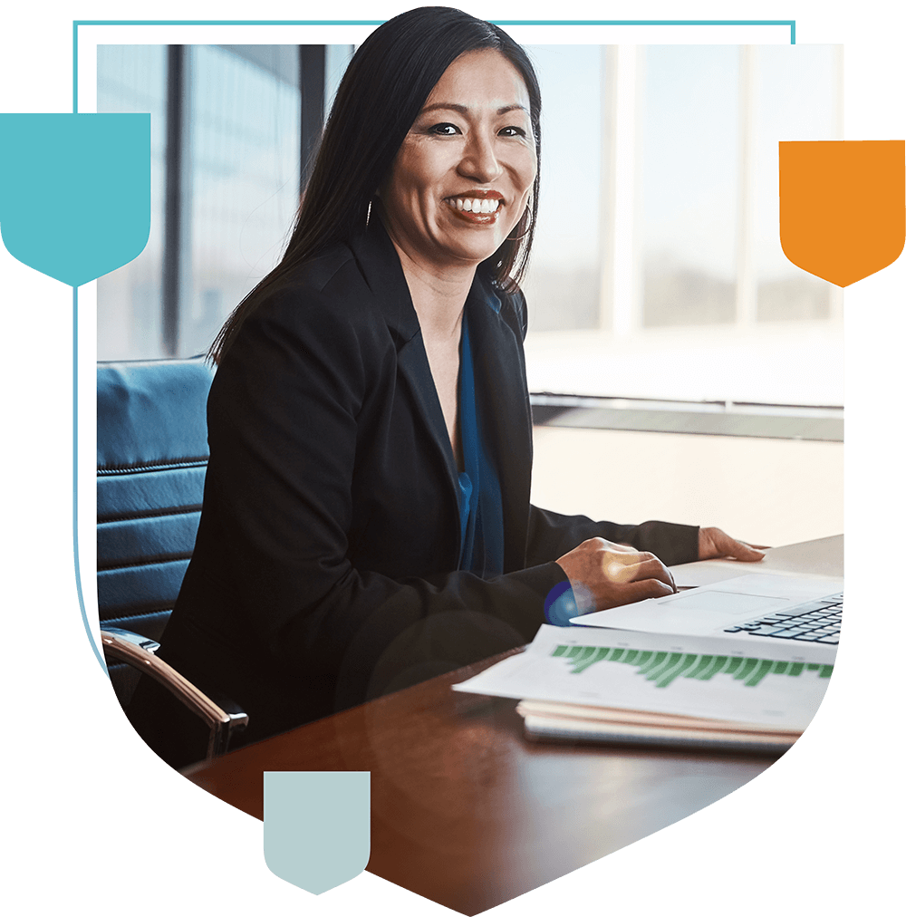 woman smiling at desk