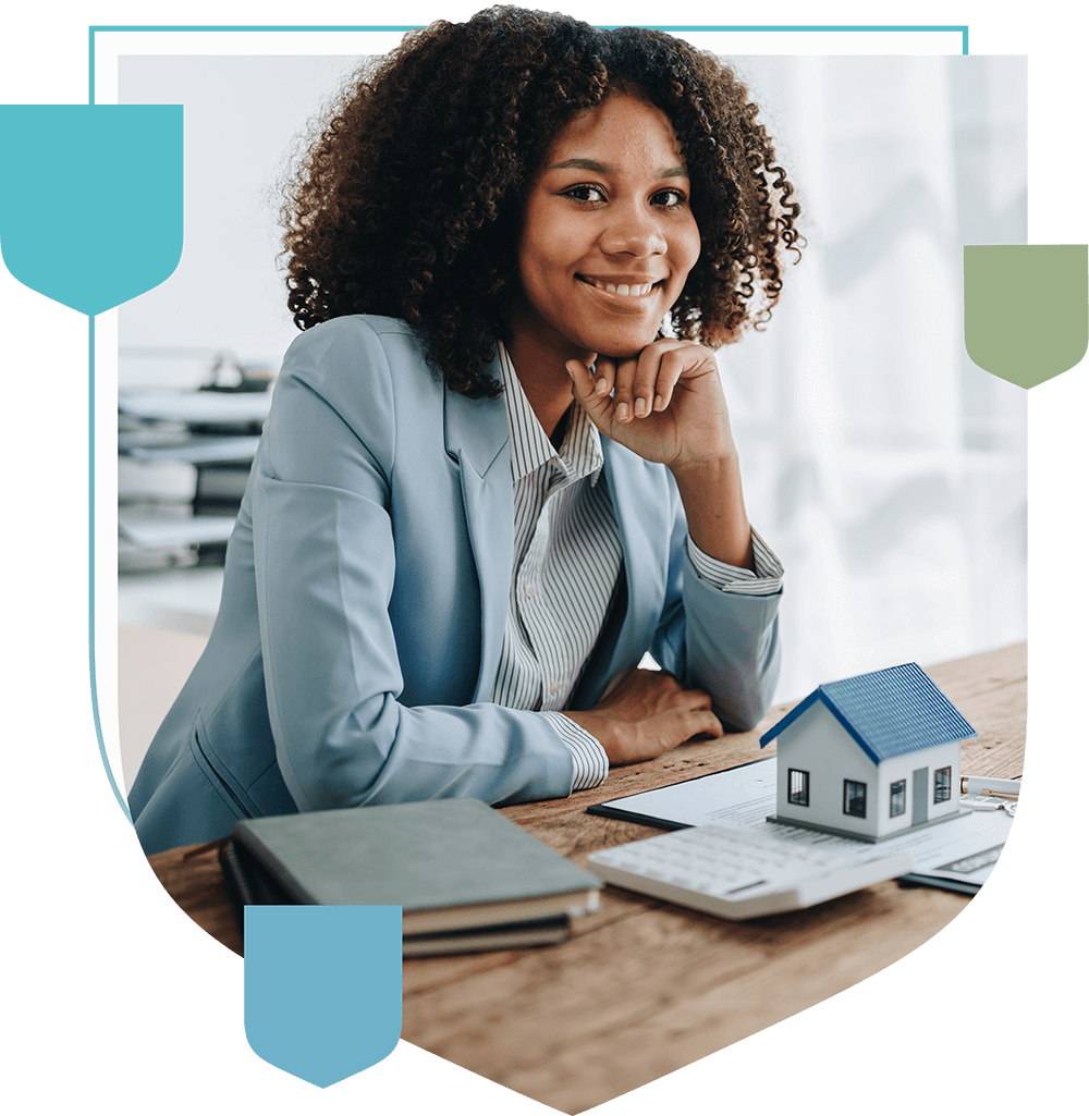 woman at desk smiling