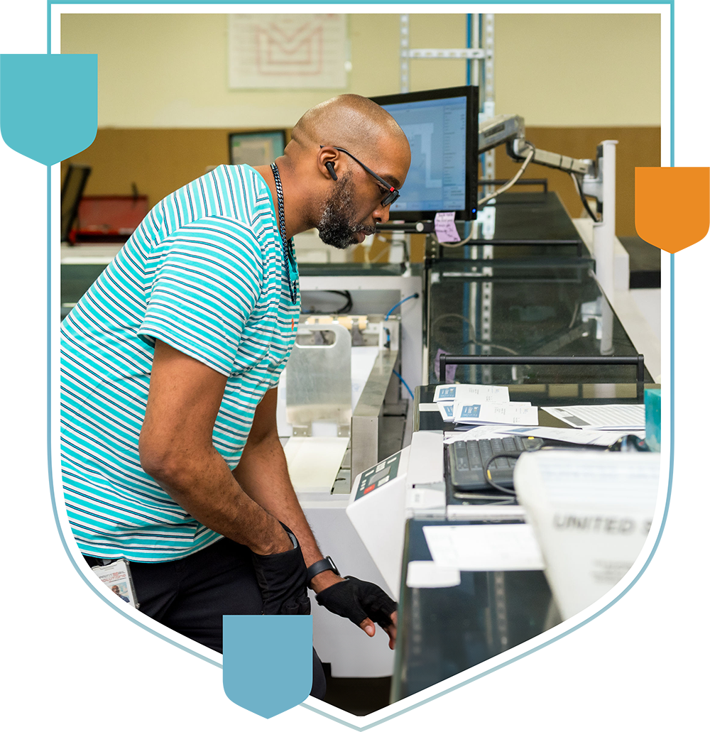 man working in printing center