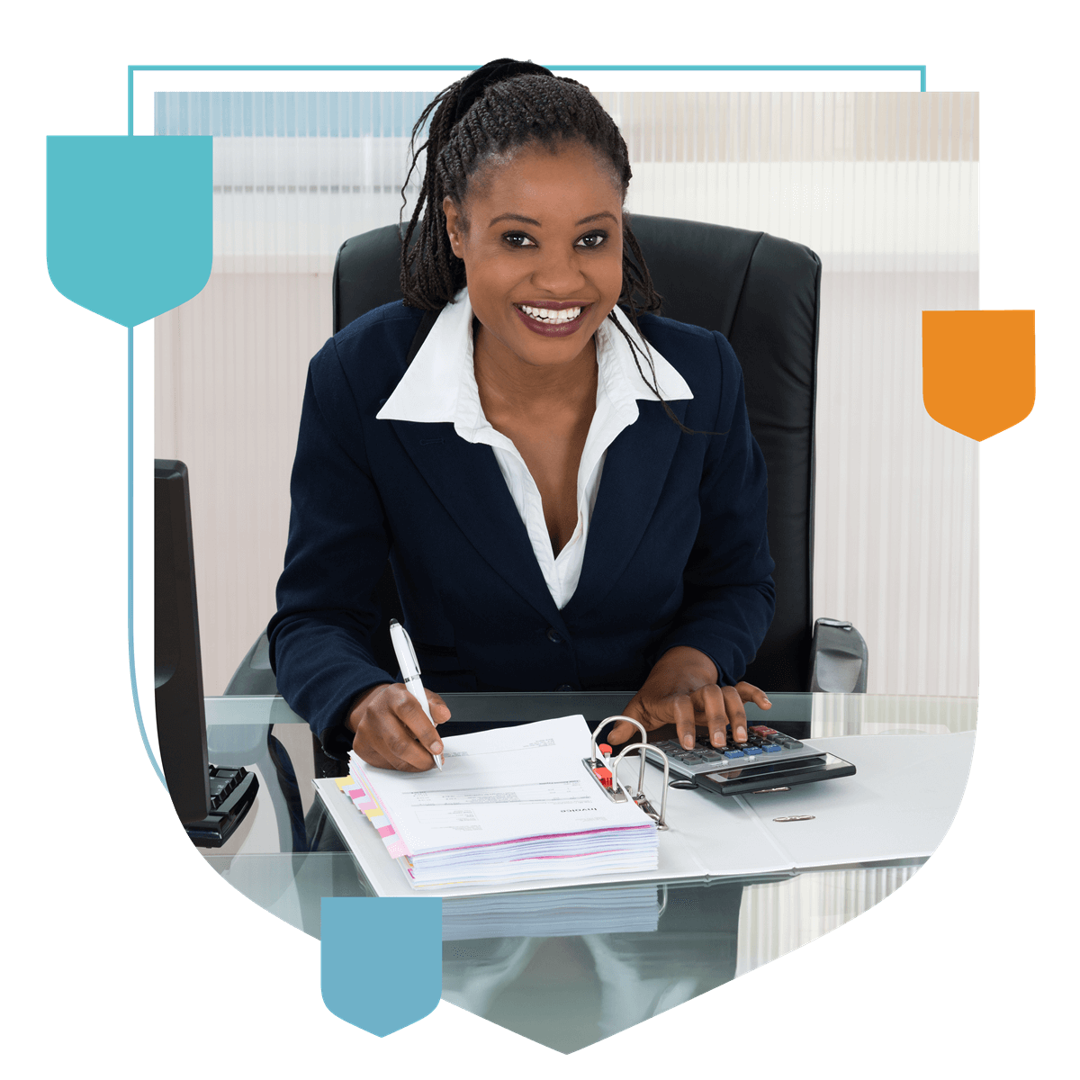 a woman sitting at a desk writing on a document